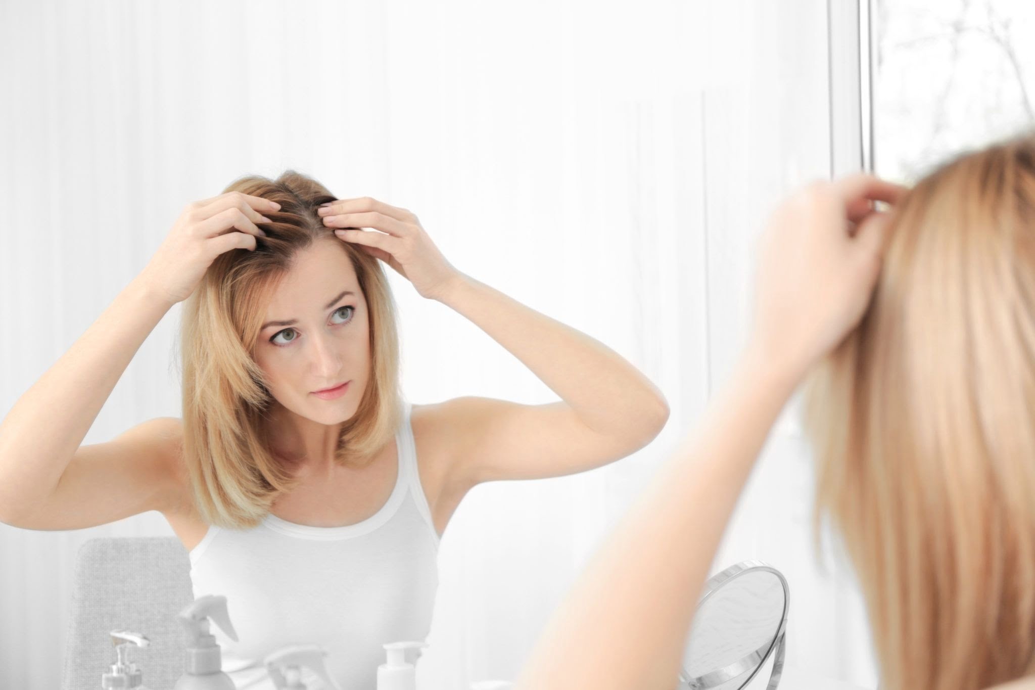 Kadınlarda saç dökülmesinin olası nedenleri ve tedavi yöntemleri #1
